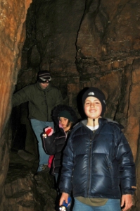 Spencer Foster, Laurel Chafin, and Jay Chafin delight in finding tri-colored bats (Perimyotis subflavus) hibernating in Devil’s Den Cave